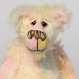 Blossom is a delightful and pretty little bear with a very sweet personality. She loves to sit in a quiet garden listening to the birds and smelling the flowers, then in the evening she likes a few cakes, to read books and to sit quietly with her family listening to all their stories. Blossom has beautiful, hand painted eyes with eyelids, a splendid nose embroidered from individual threads to compliment her colouring and she has a sweet, friendly smile