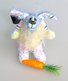 Bluebell is a small and sweet, one of a kind rabbit in beautifully coloured mohair and designer bunny fabric by Barbara Ann Bears, she stands just 5 inches/13 cm tall.  Bluebell is mostly made from a beautiful 'Peter Rabbit' cotton fabric with hand dyed blue and pale yellow mohair and hand dyed velvet paws with her carrot