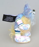 Bluebell is a small and sweet, one of a kind rabbit in beautifully coloured mohair and designer bunny fabric by Barbara Ann Bears, she stands just 5 inches/13 cm tall.  Bluebell is mostly made from a beautiful 'Peter Rabbit' cotton fabric with hand dyed blue and pale yellow mohair and hand dyed velvet paws.