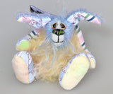 Bluebell is a small and sweet, one of a kind rabbit in beautifully coloured mohair and designer bunny fabric by Barbara Ann Bears, she stands just 5 inches/13 cm tall.  Bluebell is mostly made from a beautiful 'Peter Rabbit' cotton fabric with hand dyed blue and pale yellow mohair and hand dyed velvet paws.