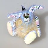 Bluebell is a small and sweet, one of a kind rabbit in beautifully coloured mohair and designer bunny fabric by Barbara Ann Bears, she stands just 5 inches/13 cm tall.  Bluebell is mostly made from a beautiful 'Peter Rabbit' cotton fabric with hand dyed blue and pale yellow mohair and hand dyed velvet paws.