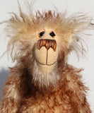 Bob is a happy, lanky and comical artist teddy bear made in wonderful tipped mohair by Barbara-Bears who doesn't take himself too seriously