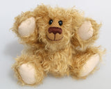 Bobbin is a wild and shaggy chap, a bear who loves to climb trees, sit around on gardening implements and generally get up to mischief. He has the childish charm of the naughty schoolboy that you can't help loving when you should be telling him to 'stop doing that' or 'get down out of there', he's just a little bear who needs love and cuddles.