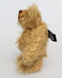 Bobbin is made from the most wonderful, wildly curly beige gold mohair, with a slightly warmer backcloth. Bobbin has beige German wool felt paw pads that blend with his mohair perfectly.