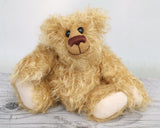 Bobbin is a wild and shaggy chap, a bear who loves to climb trees, sit around on gardening implements and generally get up to mischief. He has the childish charm of the naughty schoolboy that you can't help loving when you should be telling him to 'stop doing that' or 'get down out of there', he's just a little bear who needs love and cuddles.