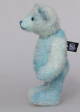 Bobby Daydream is a very handsome & subtly colourful, traditional, one of a kind artist teddy bear, in fabulous hand dyed mohair by Barbara Ann Bears, he stands 10 inches/25 cm tall and 7.5 inches/18 cm sitting. Bobby Daydream is made from a fairly short and sparse mohair, hand-dyed in natural blues, aqua and turquoise