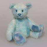 Bobby Daydream is a very handsome & subtly colourful, traditional, one of a kind artist teddy bear, in fabulous hand dyed mohair by Barbara Ann Bears, he stands 10 inches/25 cm tall and 7.5 inches/18 cm sitting. Bobby Daydream is made from a fairly short and sparse mohair, hand-dyed in natural blues, aqua and turquoise