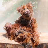 Boris Stroganov is a wild yet friendly, one of a kind, artist bear by Barbara-Ann Bears, he stands 19 inches(48 cm) tall and is 15 inches(38 cm) sitting.  He is made from long, wild and shaggy mohair that Barbara has hand-dyed in many beautiful hues of brown this is complemented by his long and very fluffy faux fur