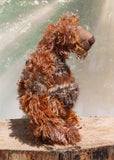 Boris Stroganov is a wild yet friendly, one of a kind, artist bear by Barbara-Ann Bears, he stands 19 inches(48 cm) tall and is 15 inches(38 cm) sitting.  He is made from long, wild and shaggy mohair that Barbara has hand-dyed in many beautiful hues of brown this is complemented by his long and very fluffy faux fur