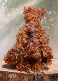 Boris Stroganov is a wild yet friendly, one of a kind, artist bear by Barbara-Ann Bears, he stands 19 inches(48 cm) tall and is 15 inches(38 cm) sitting.  He is made from long, wild and shaggy mohair that Barbara has hand-dyed in many beautiful hues of brown this is complemented by his long and very fluffy faux fur