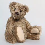 Bosworth is a solid and distinguished one of a kind, traditional, mohair artist teddy bear by Barbara Ann Bears, he stands 17 inches (43cm) tall and is 12 inches (31cm) sitting and made from fairly long, slightly wavy greyish-brown brown mohair with a hint of green, he has beige wool felt paw pads and hand painted eyes