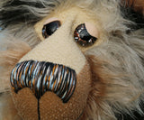 Brabinger is a large, magnificent, charming and cuddly, one of a kind, artist bear by Barbara-Ann Bears in luxurious mohair and faux fur Brabinger is an impressive and large teddy bear, he stands 21 inches (53 cm) tall and is 15.5 inches (39 cm) sitting. Brabinger is a very handsome, relaxed and friendly bear