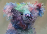 Braedon, a traditional, one of a kind artist teddy bear, in fabulous hand dyed mohair by Barbara Ann Bears, he stands 15 inches/38cm tall and is 10.5 inches/27cm sitting. Braedon is made from medium length distressed German mohair hand-dyed by Barbara  in shades of blue with splashes of pink, lilac, emerald and plum