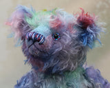 Braedon, a traditional, one of a kind artist teddy bear, in fabulous hand dyed mohair by Barbara Ann Bears, he stands 15 inches/38cm tall and is 10.5 inches/27cm sitting. Braedon is made from medium length distressed German mohair hand-dyed by Barbara  in shades of blue with splashes of pink, lilac, emerald and plum
