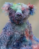 Braedon, a traditional, one of a kind artist teddy bear, in fabulous hand dyed mohair by Barbara Ann Bears, he stands 15 inches/38cm tall and is 10.5 inches/27cm sitting. Braedon is made from medium length distressed German mohair hand-dyed by Barbara  in shades of blue with splashes of pink, lilac, emerald and plum