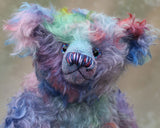 Braedon, a traditional, one of a kind artist teddy bear, in fabulous hand dyed mohair by Barbara Ann Bears, he stands 15 inches/38cm tall and is 10.5 inches/27cm sitting. Braedon is made from medium length distressed German mohair hand-dyed by Barbara  in shades of blue with splashes of pink, lilac, emerald and plum