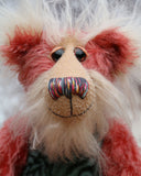 Billy 'Brains' McMurray, a cheerful, inquisitive and loveable one of a kind artist bear in by Barbara-Ann Bears, he stands 13.5 inches(34 cm) tall and is 10 inches ( 25 cm) sitting. Billy is made from a straight pile strawberry red mohair with brown tipping, his tummy is a turquoise faux fur with a brain coral pattern