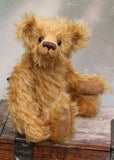 Braithwaite, a lovable slightly raggedy, one of a kind, traditional artist teddy bear made from beautiful German mohair by Barbara-Ann Bears. Braithwaite stands 11 inches (28cm) tall and is 8 inches (20cm) sitting. Braithwaite comes from the same design as we used to make Marigold's teddy bear for Downton Abbey
