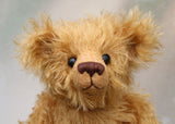 Braithwaite, a lovable slightly raggedy, one of a kind, traditional artist teddy bear made from beautiful German mohair by Barbara-Ann Bears. Braithwaite stands 11 inches (28cm) tall and is 8 inches (20cm) sitting. Braithwaite comes from the same design as we used to make Marigold's teddy bear for Downton Abbey