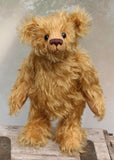 Braithwaite, a lovable slightly raggedy, one of a kind, traditional artist teddy bear made from beautiful German mohair by Barbara-Ann Bears. Braithwaite stands 11 inches (28cm) tall and is 8 inches (20cm) sitting. Braithwaite comes from the same design as we used to make Marigold's teddy bear for Downton Abbey