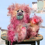 Bramble is a sweet and very cheerful, one of a kind artist bear, in hand dyed mohair by Barbara-Ann Bears Bramble stands 10 inches( 25 cm) tall and is 7.5 inches (19 cm) sitting. Bramble is a beautifully coloured and very happy teddy bear who is also wonderfully fluffy, he isn't a bear to dazzle but he is full of love and cuddles.