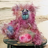 Bramble is a sweet and very cheerful, one of a kind artist bear, in hand dyed mohair by Barbara-Ann Bears Bramble stands 10 inches( 25 cm) tall and is 7.5 inches (19 cm) sitting. Bramble is a beautifully coloured and very happy teddy bear who is also wonderfully fluffy, he isn't a bear to dazzle but he is full of love and cuddles.
