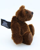 Bruce McCubbin is a very sweet and happy little brown mohair artist bear by Barbara Ann Bears, he stands just 6 inches( 15 cm) tall and is 4.5 inches (11 cm) sitting. Bruce McCubbin is made from a short, stubbly brown mohair, perfect mohair for a proper little bear, his paw pads are made from the same mohair trimmed