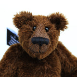 Bruce McCubbin is a sweet and happy little bear. Bruce likes to think he's a proper little bear, that he can go our into the woods to hunt elk and reindeer, well at least beetles and acorns and maybe a spider if it isn't too scary. A bigger spider will have him running back to you, climbing up your back, over your shoulder until he is right in front of your face demanding a cuddle, well he's just a sweet little bear and he's very good at warning you if big hairy spiders are about.