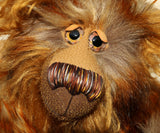 Bruno Hugmore is a very fluffy and cuddly, one of a kind artist teddy bear, in gorgeous faux fur and mohair by Barbara-Ann Bears Bruno Hugmore stands 17inches (43 cm) tall and is 13 inches (33 cm) sitting. He is a fairly large and fluffy bear in beautifully harmonious colours, like a walk through a forest in winter on a carpet of frosted leaves.