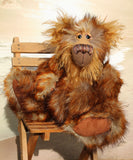 Bruno Hugmore is a very fluffy and cuddly, one of a kind artist teddy bear, in gorgeous faux fur and mohair by Barbara-Ann Bears Bruno Hugmore stands 17inches (43 cm) tall and is 13 inches (33 cm) sitting. He is a fairly large and fluffy bear in beautifully harmonious colours, like a walk through a forest in winter on a carpet of frosted leaves.