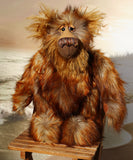 Bruno Hugmore is a very fluffy and cuddly, one of a kind artist teddy bear, in gorgeous faux fur and mohair by Barbara-Ann Bears Bruno Hugmore stands 17inches (43 cm) tall and is 13 inches (33 cm) sitting. He is a fairly large and fluffy bear in beautifully harmonious colours, like a walk through a forest in winter on a carpet of frosted leaves.