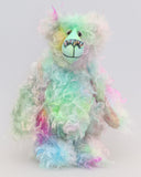 Bryn Bryn Bruin is made from one beautiful piece of hand dyed mohair, a long and fluffy, tousled mohair hand dyed with splashes of pastel colours, turquoise, jade, pale blue, soft pink, amber, green, gold, magenta and lilac. He has hand dyed velvet paw pads.  Bryn's beautiful eyes were hand painted to match his mohair as were his hand coloured eyelids. His nose was embroidered with individual threads to match his colouring and he has a sweet and cheerful smile