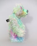Bryn Bryn Bruin is made from one beautiful piece of hand dyed mohair, a long and fluffy, tousled mohair hand dyed with splashes of pastel colours, turquoise, jade, pale blue, soft pink, amber, green, gold, magenta and lilac. He has hand dyed velvet paw pads. Bryn's beautiful eyes were hand painted to match his mohair as were his hand coloured eyelids. His nose was embroidered with individual threads to match his colouring and he has a sweet and cheerful smile