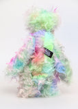 Bryn Bryn Bruin is made from one beautiful piece of hand dyed mohair, a long and fluffy, tousled mohair hand dyed with splashes of pastel colours, turquoise, jade, pale blue, soft pink, amber, green, gold, magenta and lilac. He has hand dyed velvet paw pads. Bryn's beautiful eyes were hand painted to match his mohair as were his hand coloured eyelids. His nose was embroidered with individual threads to match his colouring and he has a sweet and cheerful smile