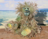 Byron is a wild thing, yet a very friendly wild thing, a one of a kind, hand dyed mohair artist bear by Barbara-Ann Bears, he stands 10.5 inches (26 cm) tall and is 8 inches (20 cm) sitting. He is made from a gorgeous, long, straggly mohair that Barbara has dyed in jade, turquoise with some green, amber and sky blue
