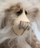 Calhoun is a charming and very friendly, one of a kind, artist bear by Barbara-Ann Bears in wonderfully fluffy tipped mohair and faux fur, he stands 11.5 inches(29 cm) tall and is 8.5 inches (21 cm) sitting.