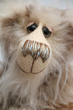 Calhoun is a charming and very friendly, one of a kind, artist bear by Barbara-Ann Bears in wonderfully fluffy tipped mohair and faux fur, he stands 11.5 inches(29 cm) tall and is 8.5 inches (21 cm) sitting.
