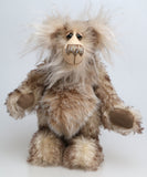 Calhoun is a charming and very friendly, one of a kind, artist bear by Barbara-Ann Bears in wonderfully fluffy tipped mohair and faux fur, he stands 11.5 inches(29 cm) tall and is 8.5 inches (21 cm) sitting.