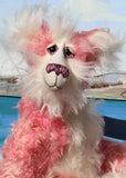 Camellia is a very beautiful, elegant and glamorous one of a kind artist bear by Barbara-Ann Bears in luxurious hand-dyed fluffy pink mohair She's 25 inches(64 cm) tall from her toes to her head and is 18 inches(46 cm) sitting from her bottom to her head, she has flexible knees and bent legs so she sits rather elegantly.