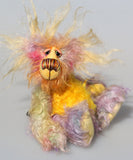 Cameron Chortles is a very happy teddy bear,he is quite colourful in a subdued way, a one of a kind, mohair artist bear by Barbara-Ann Bears Cameron Chortles is quite a little bear, he stands just 7 inches( 17 cm) tall and is 5 inches ( 13 cm) sitting, these measurements don't include his very fluffy ears which add another 2.5 inches (6cm).