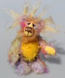 Cameron Chortles is a very happy teddy bear,he is quite colourful in a subdued way, a one of a kind, mohair artist bear by Barbara-Ann Bears Cameron Chortles is quite a little bear, he stands just 7 inches( 17 cm) tall and is 5 inches ( 13 cm) sitting, these measurements don't include his very fluffy ears which add another 2.5 inches (6cm).