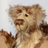 Carlyle is a very handsome and cuddly, beautifully coloured, one of a kind, teddy bear by Barbara-Ann Bears in wonderful batik mohair Carlyle stands 10 inches(25 cm) tall and is 7.5 inches (19 cm) sitting.  Carlyle is a very calm and relaxed teddy bear, he is made from the most gorgeous batik and fluffy mohairs