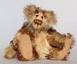 Carlyle is a very handsome and cuddly, beautifully coloured, one of a kind, teddy bear by Barbara-Ann Bears in wonderful batik mohair Carlyle stands 10 inches(25 cm) tall and is 7.5 inches (19 cm) sitting.  Carlyle is a very calm and relaxed teddy bear, he is made from the most gorgeous batik and fluffy mohairs