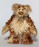 Carlyle is a very handsome and cuddly, beautifully coloured, one of a kind, teddy bear by Barbara-Ann Bears in wonderful batik mohair Carlyle stands 10 inches(25 cm) tall and is 7.5 inches (19 cm) sitting.  Carlyle is a very calm and relaxed teddy bear, he is made from the most gorgeous batik and fluffy mohairs