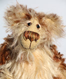 Carlyle is a very handsome and cuddly, beautifully coloured, one of a kind, teddy bear by Barbara-Ann Bears in wonderful batik mohair Carlyle stands 10 inches(25 cm) tall and is 7.5 inches (19 cm) sitting.  Carlyle is a very calm and relaxed teddy bear, he is made from the most gorgeous batik and fluffy mohairs