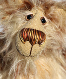 Carlyle is a very handsome and cuddly, beautifully coloured, one of a kind, teddy bear by Barbara-Ann Bears in wonderful batik mohair Carlyle stands 10 inches(25 cm) tall and is 7.5 inches (19 cm) sitting.  Carlyle is a very calm and relaxed teddy bear, he is made from the most gorgeous batik and fluffy mohairs