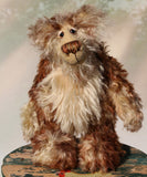 Carlyle is a very handsome and cuddly, beautifully coloured, one of a kind, teddy bear by Barbara-Ann Bears in wonderful batik mohair Carlyle stands 10 inches(25 cm) tall and is 7.5 inches (19 cm) sitting.  Carlyle is a very calm and relaxed teddy bear, he is made from the most gorgeous batik and fluffy mohairs