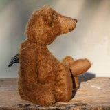 Charleston is a charming, traditional one of a kind artist bear in German mohair by Barbara Ann Bears, he stands 10 inches/27 cm tall and is 7.5 inches/22 cm sitting. Ambrose is made from wildly distressed, 'proper brown' German mohair, he has matching brown, wool-felt paw pads and vintage boot buttons for eyes
