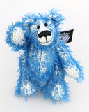 Charlie McCubbin is a very sweet and happy little blue mohair artist bear by Barbara Ann Bears, he stands just 5.5 inches( 14 cm) tall and is 4 inches (10 cm) sitting. Charlie McCubbin is made from a sparse, stringy blue mohair that has a pale, almost white, cotton backcloth, giving him a charmingly scruffy appearance