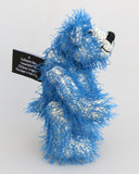 Charlie McCubbin is a very sweet and happy little blue mohair artist bear by Barbara Ann Bears, he stands just 5.5 inches( 14 cm) tall and is 4 inches (10 cm) sitting. Charlie McCubbin is made from a sparse, stringy blue mohair that has a pale, almost white, cotton backcloth, giving him a charmingly scruffy appearance